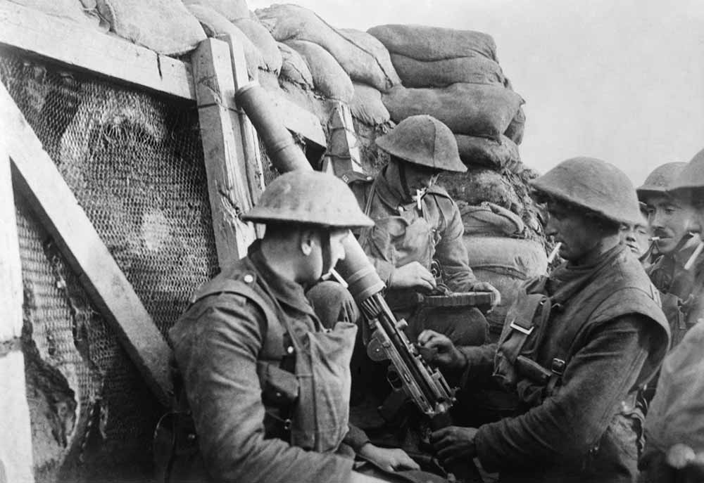 British WW1 machine gun crew in a front line trench. 1914-18.