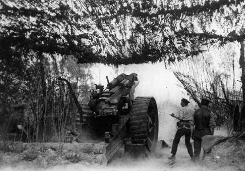 Howitzer firing during battle