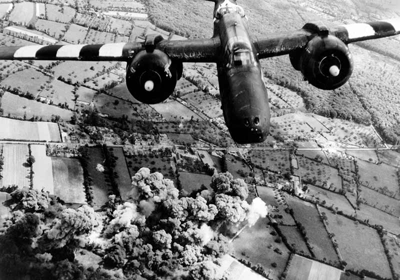 Light bomber with D-Day 'invasion stripes'