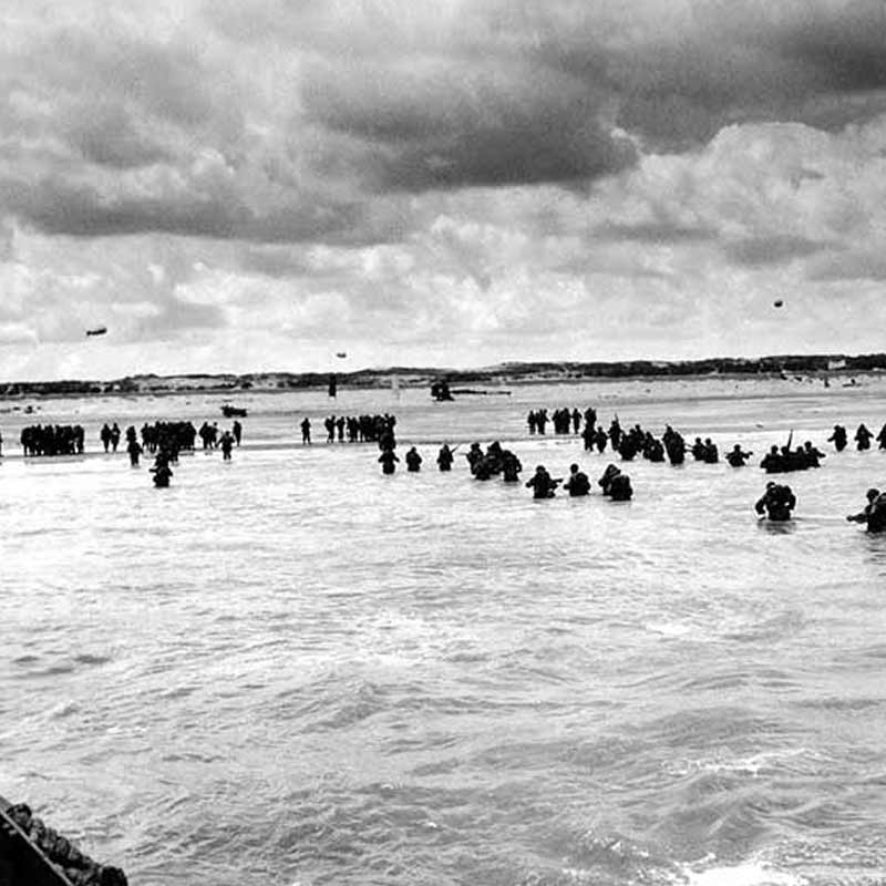 Troops advancing in Normandy